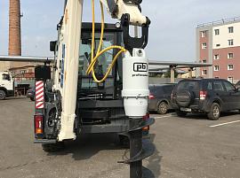 Вращатель Profbreaker SHB8 на экскаваторе-погрузчике Terex TLB825